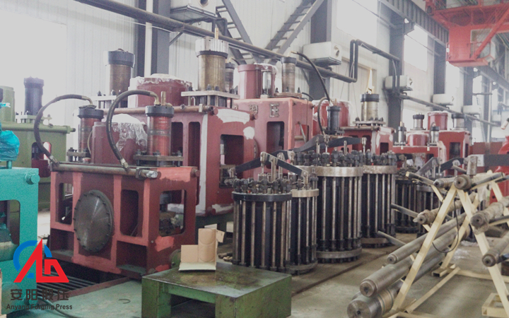 Conversion of open die fully hydraulic forging hammer power head assembly